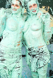 Two naughty slutty babes getting messy with lots of paint
