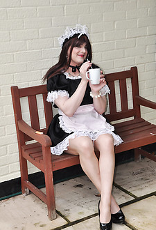 This horny TGirl tart is dressed as a saucy maid and she is ready to serve.