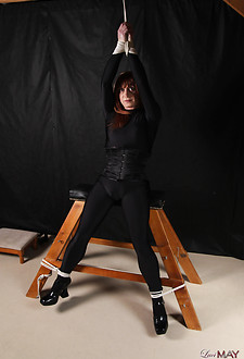 Sexy Lucimay is covered in black spandex and she is ready to be tied up