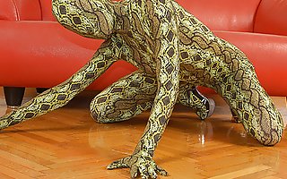 Spandex Snake-woman reveals pussy