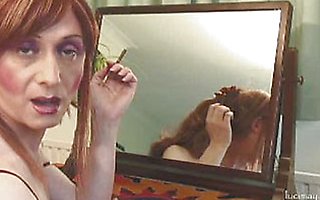 Lucimay putting on her make up and smoking